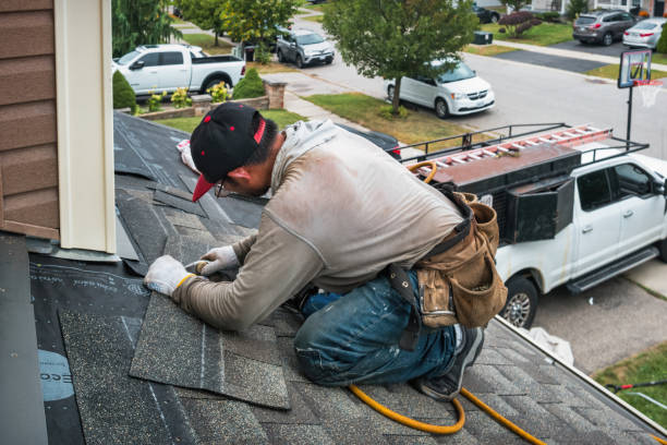 Professional Roofing technician working in Bath, NY